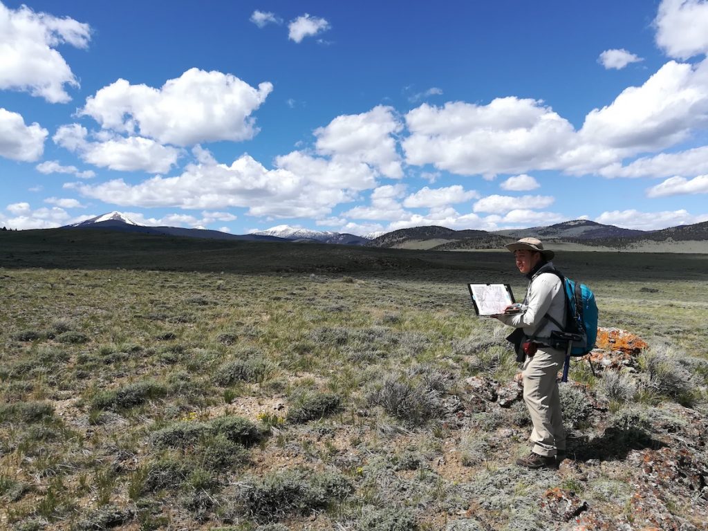 The author doing field mapping in southwestern Montana in June 2019. Courtesy of Jeng Hann Chong.